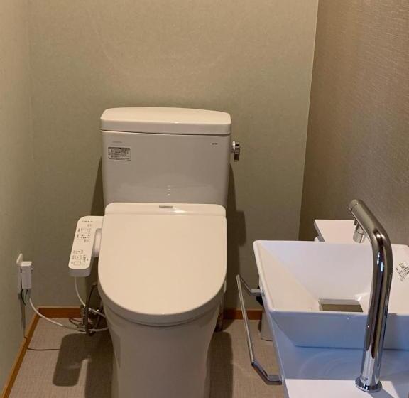 Четырехместный Номер Стандарт Вид на Сад, Onsen & Garden Asante Inn