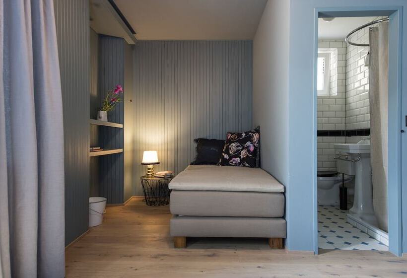 Номер Deluxe, De Londres