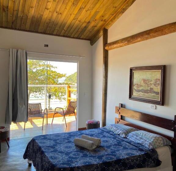 Quarto Deluxe Vista Mar com Sacada, Chales Marissol