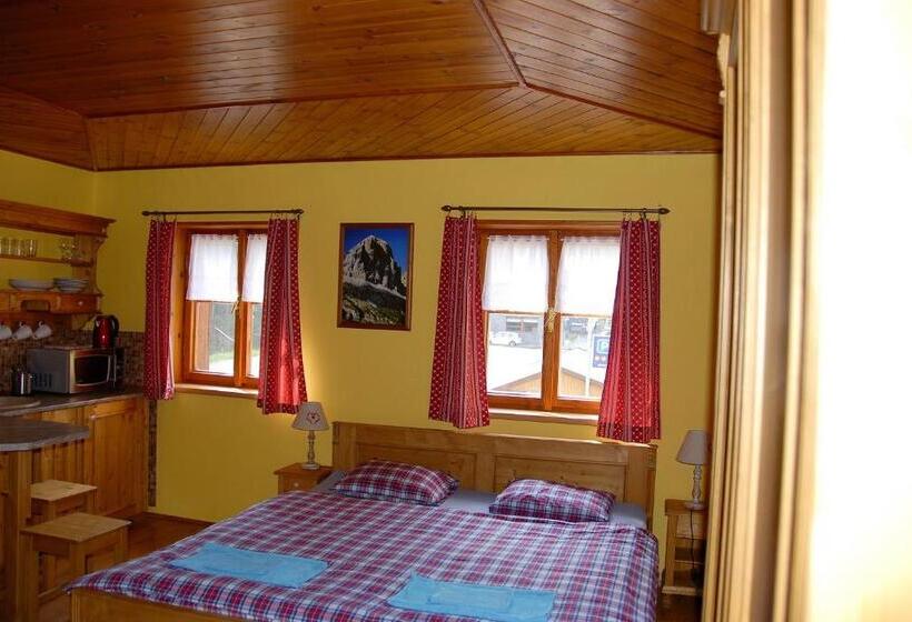 سوییت با چشم‌انداز کوه, Pension Cortina