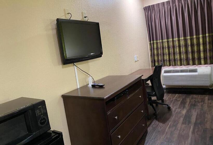 キングサイズベッドのスタンダードルーム, Red Lion Inn & Suites Iah Airport East