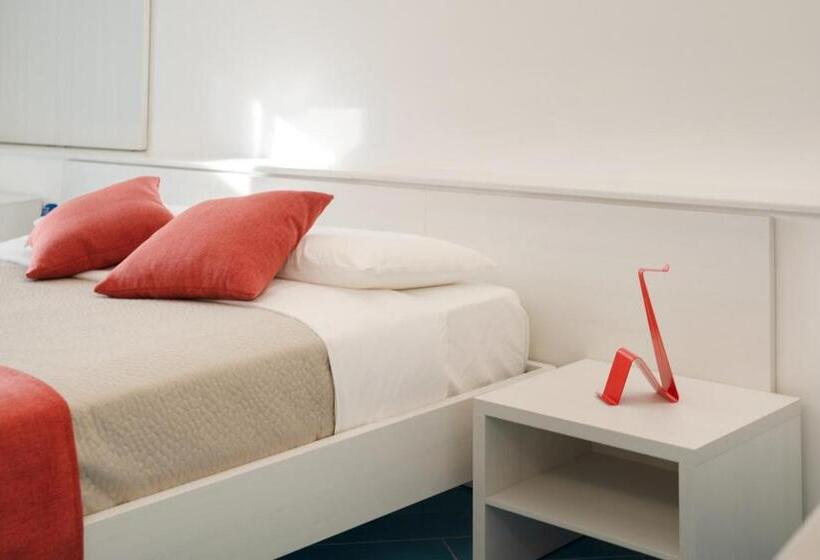 Quarto Triplo Estandar, Corallo Residence