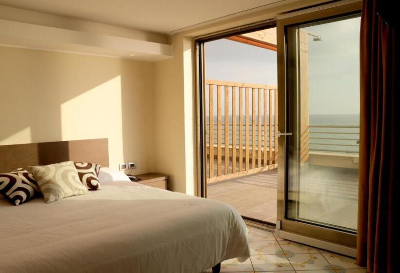 Quarto Deluxe Vista Mar, Ancora