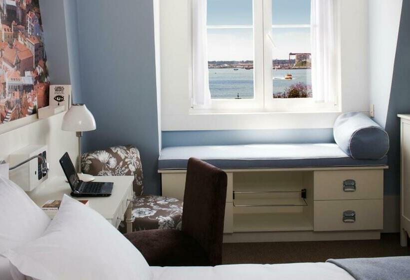 Quarto superior vista rio, Lx Boutique