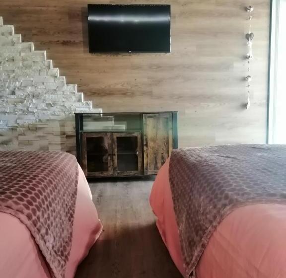 Люкс Вид на Сад, Lapausedegout Piscine Chambres Climatisées Terrasse Ou Patio