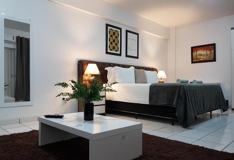 Люкс Deluxe Кровать Кинг, B & A Suites Inn Hotel   Quarto Luxo âmbar
