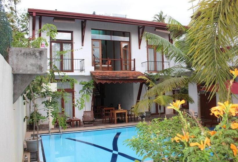 Quarto Deluxe Vista Piscina, Villa Kapuru