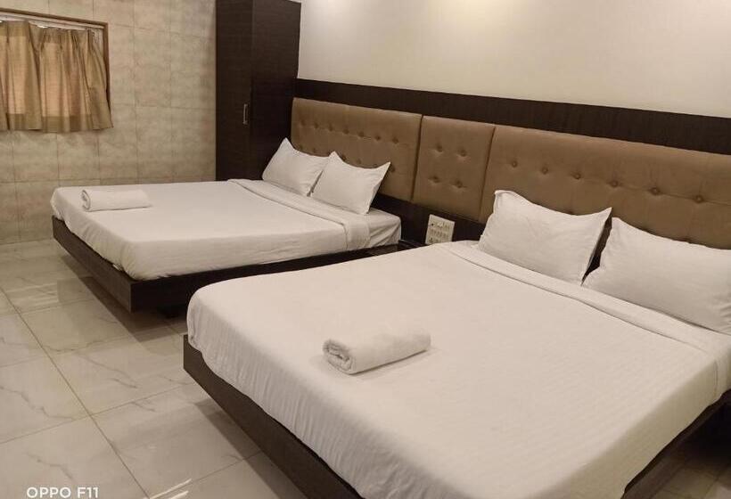 חדר דלוקס לארבעה, Bkc Palace Inn   Jio World Convention Center And Us Visa Center హోటల్ బి కే సి ప్యాలెస్ ఇన్