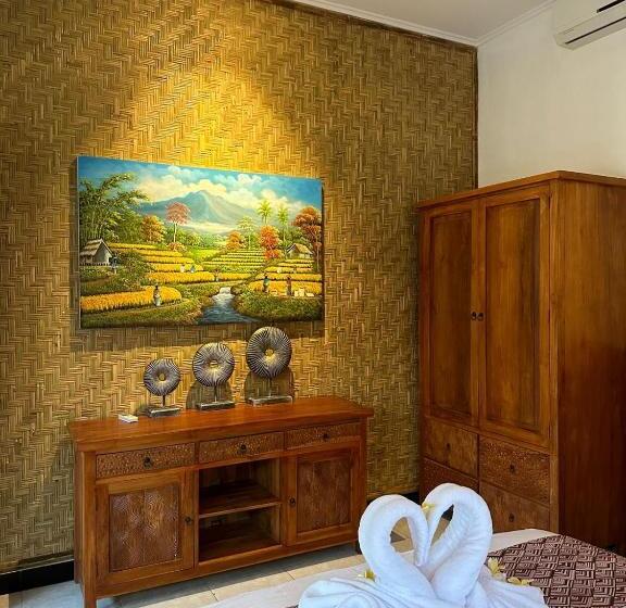سوییت با چشم‌انداز باغ, Tiga Naga Villa