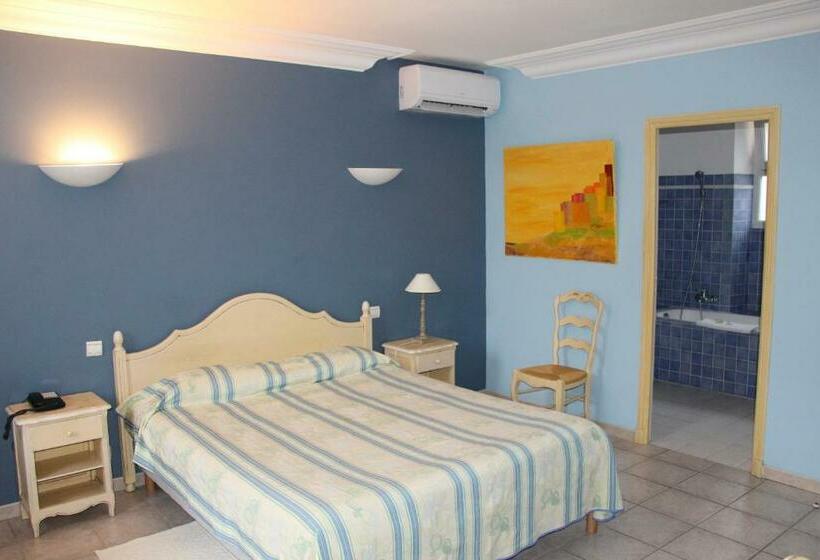 Quarto Deluxe, Hôtel Les Palmiers