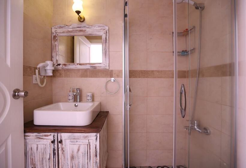 Quarto Triplo Comfort, Rüzgar Gülü