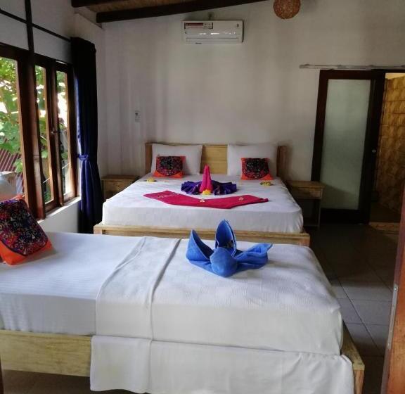غرفة ديلوكس ثلاثية مطلة على البحر, Gili Turtle Beach Resort