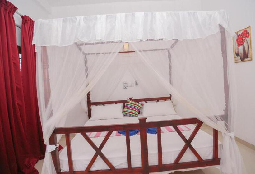 اتاق استاندارد با چشم‌انداز باغ, Tithira Guest House