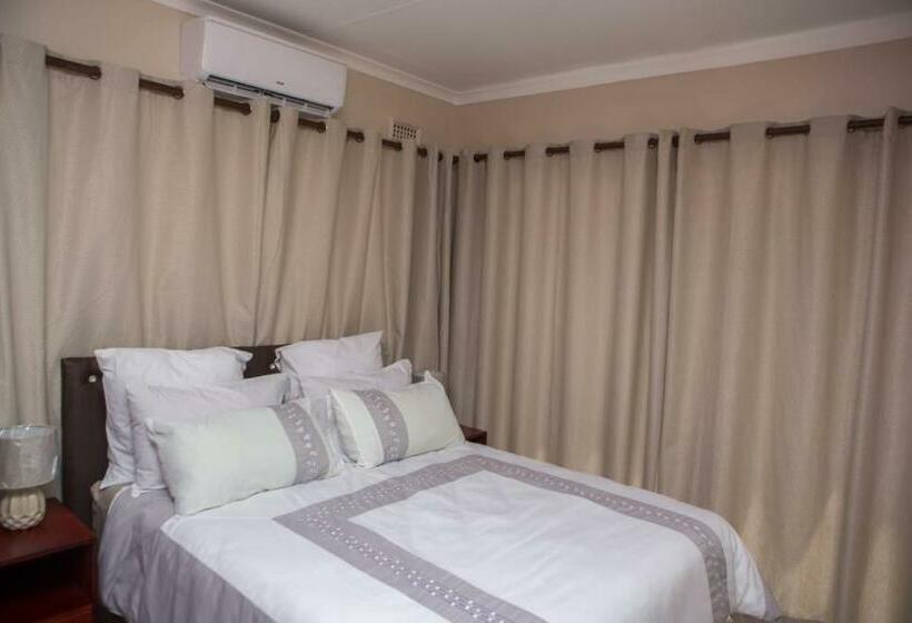 Quarto Economy, Dyna Guest House