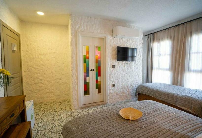 Quarto deluxe, Cunda