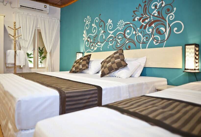 اتاق سه نفره دلوکس با چشم‌انداز باغ, Stingray Beach Inn
