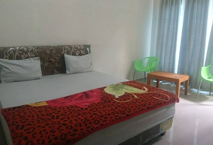 Номер Deluxe, Sriwijaya Hotel Siantar