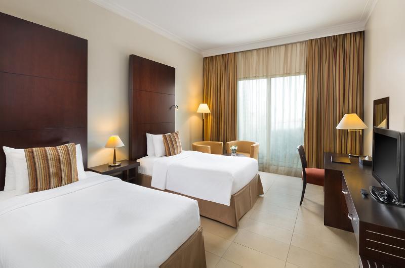 מיטת קינג בסוויטה, American Hotel Atlanta Downtown, Tapestry Collection Hilton