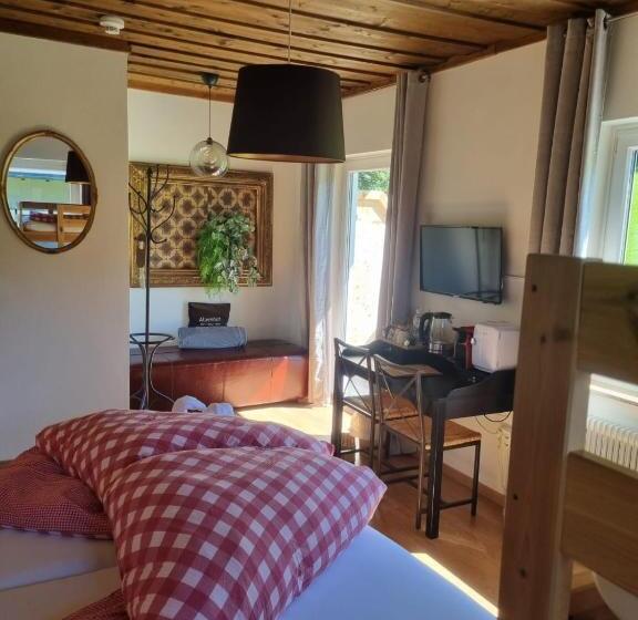 Четырехместный Номер Deluxe, Boutique Hotel Alpenhof