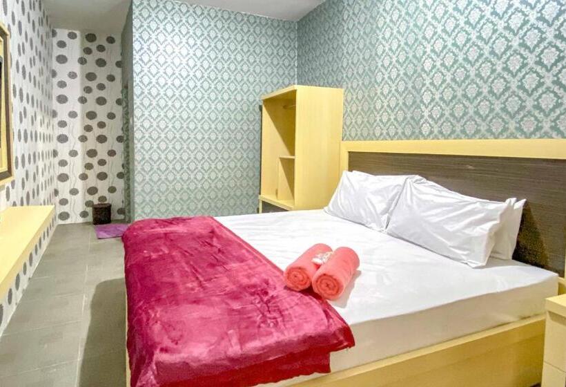 Номер Стандарт, Tini S Guest House Malang Mitra Reddoorz