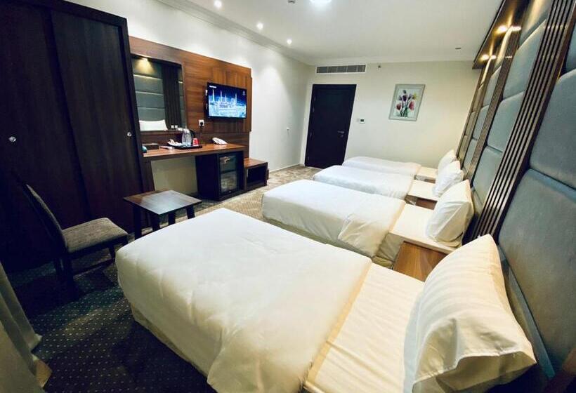 Quarto Quádruplo Deluxe, Itlalat Uhud