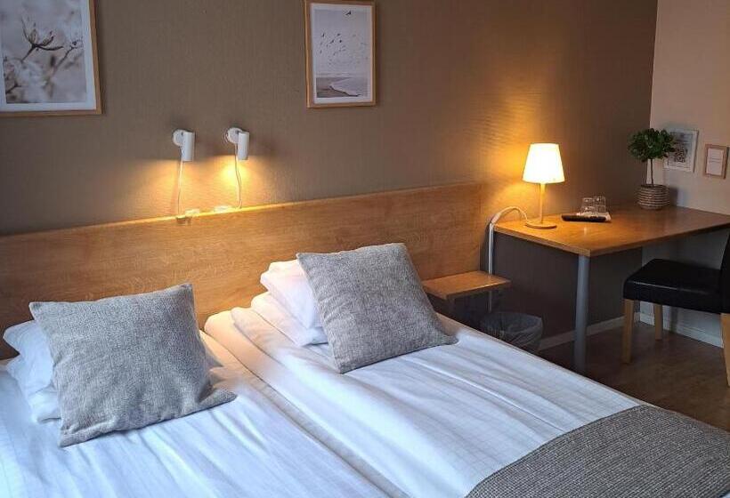 Quarto standard, L Rådhuset
