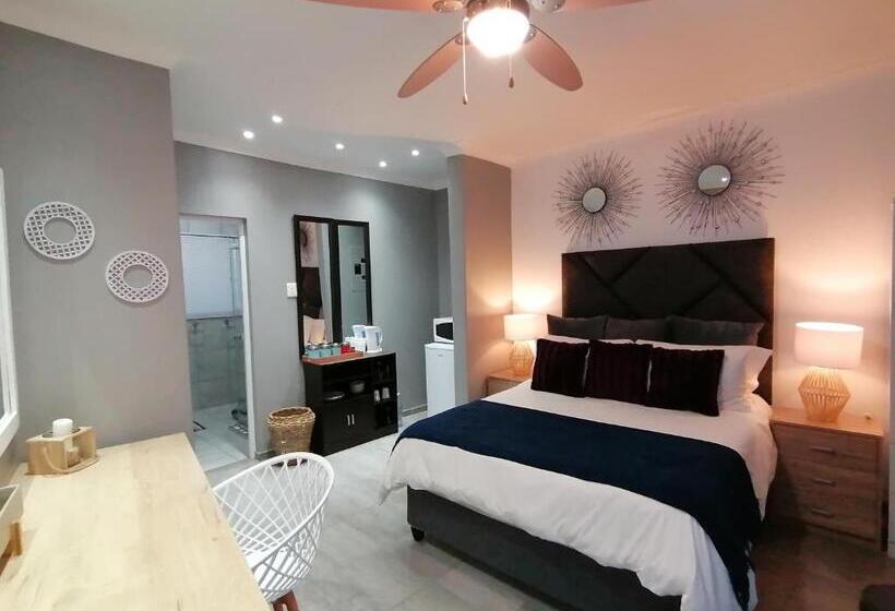 اتاق استاندارد با چشم‌انداز باغ, Roxy S Rest Guest House