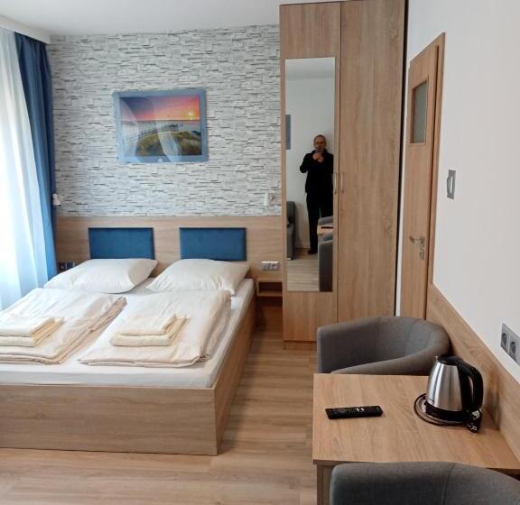 Quarto Quadruple Standart com Varanda, Villa Selavi