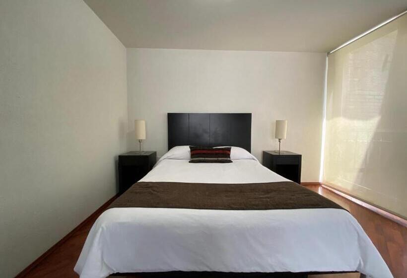 Escritório Estándar, Grupo Kings Suites Chimborazo