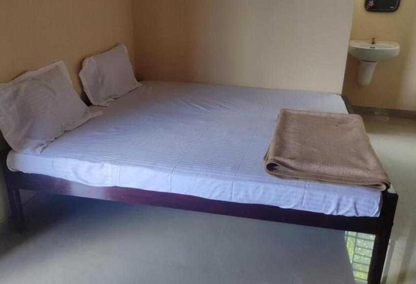 Quarto Triplo Clássico, Spot On Sree Yamuna Tourist Home