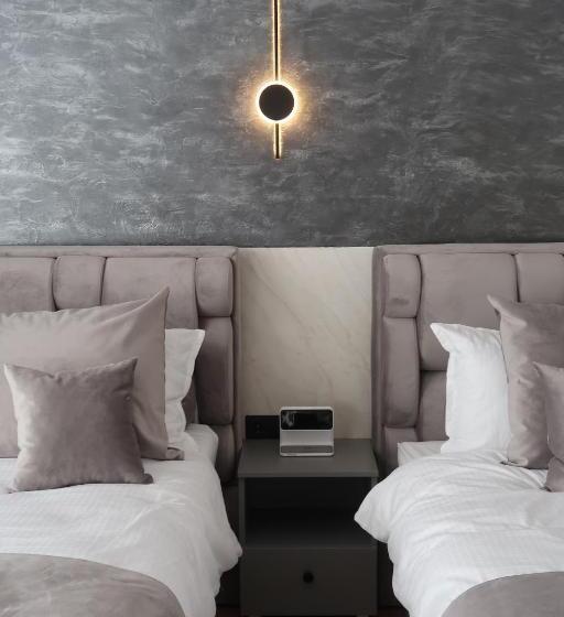 Quarto Triplo Deluxe, Eden Suites