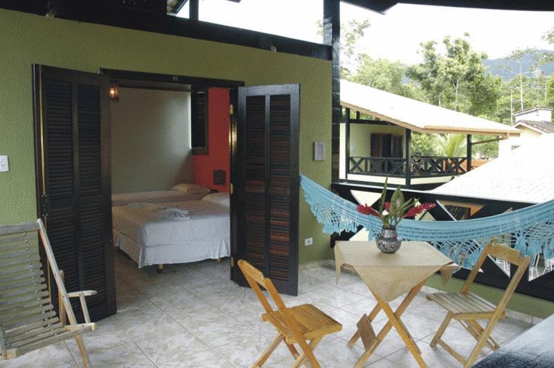 Quarto Superior com Sacada, Pousada Pedra Porosa