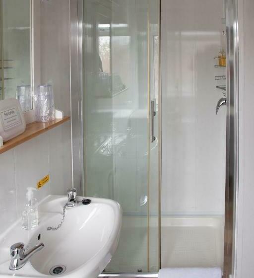 Quarto Estandar Cama King, Q Accommodation