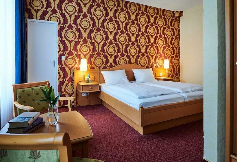 Quarto Estandar Individual, Dom