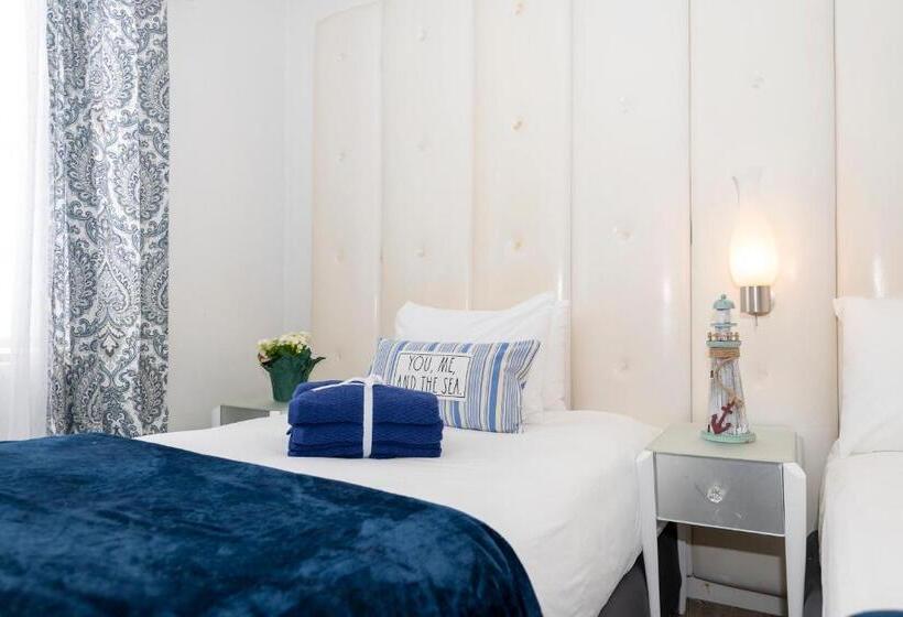 إستديو عائلى, Norman S Hotel And Dining