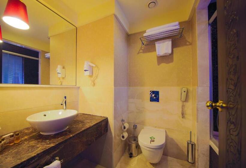 Quarto Triplo Estandar com Sacada, Horus Paradise Resort - All Inclusive