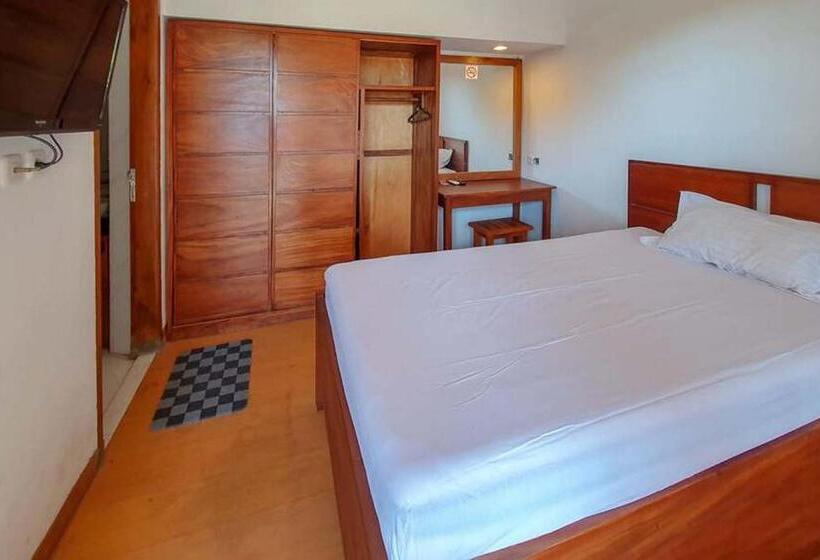 Номер Deluxe, Rumah Eyang Tardjo Syariah Mitra Reddoorz