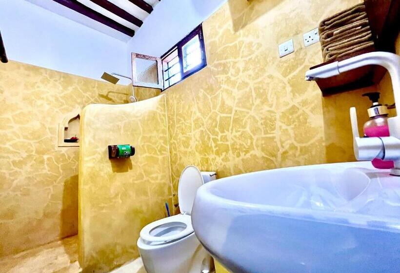 اتاق استاندارد چهارنفره با چشم‌انداز باغ, Chikachika Beach B&b