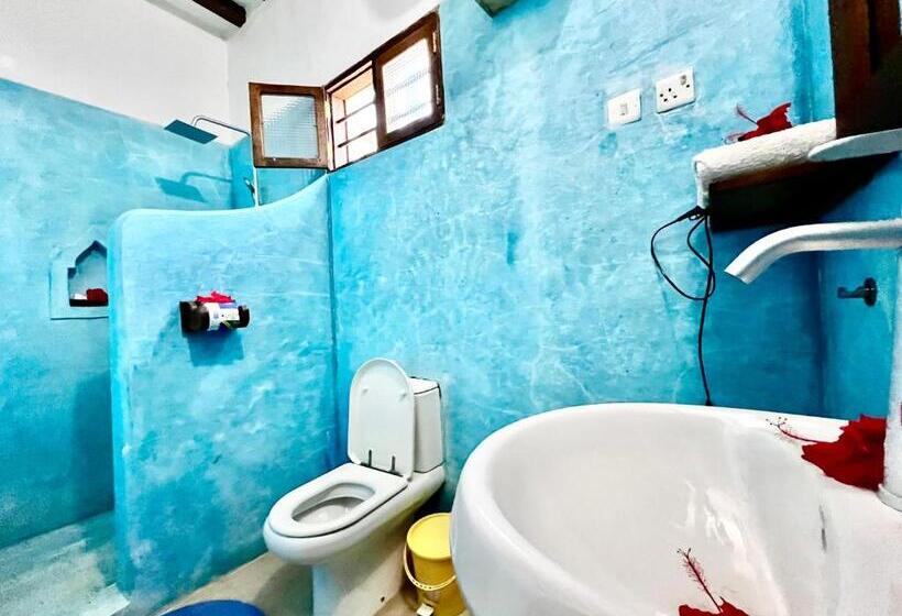 اتاق استاندارد سه تخته با چشم‌انداز باغ, Chikachika Beach B&b