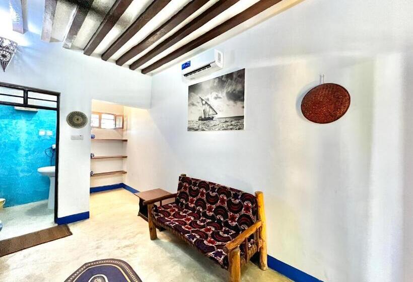 اتاق استاندارد سه تخته با چشم‌انداز باغ, Chikachika Beach B&b