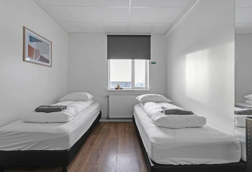 اتاق استاندارد با سرویس بهداشتی مشترک, Bank Guesthouse