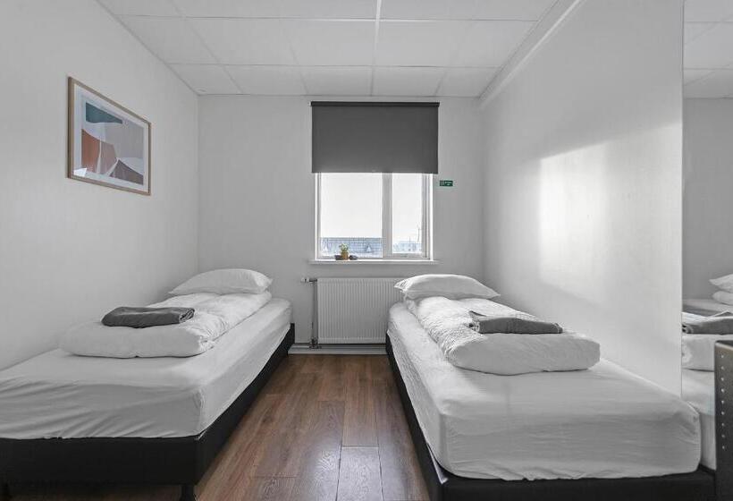 اتاق استاندارد با سرویس بهداشتی مشترک, Bank Guesthouse