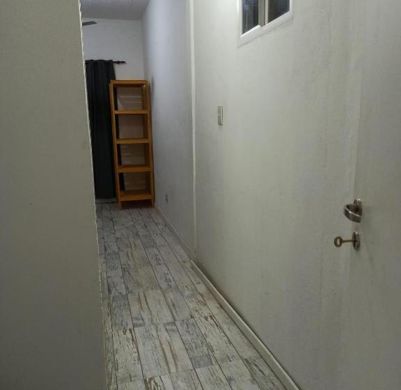 Quarto Triplo Estandar, El Faro Hostel