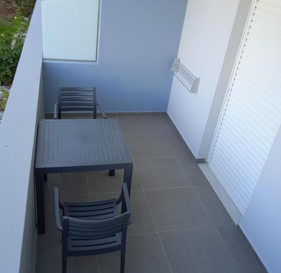 Quarto Superior Vista Jardim, Gelli Apartments