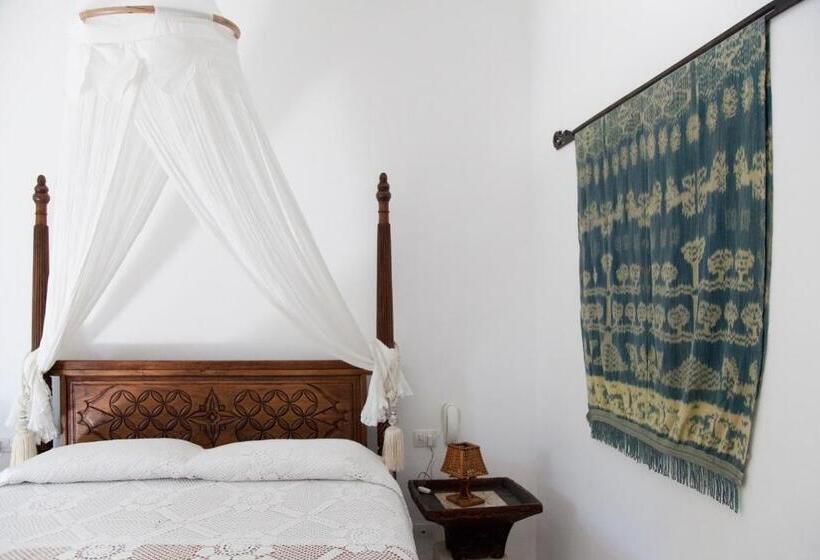 اتاق استاندارد سه تخته با چشم‌انداز باغ, Quartara Boutique