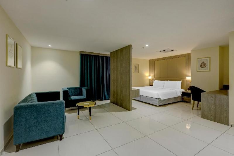 Трехместный Номер Deluxe, Sunday Hotel Vadodara