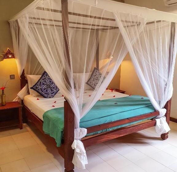 Дом 2 Спальни, Flame Tree Cottages