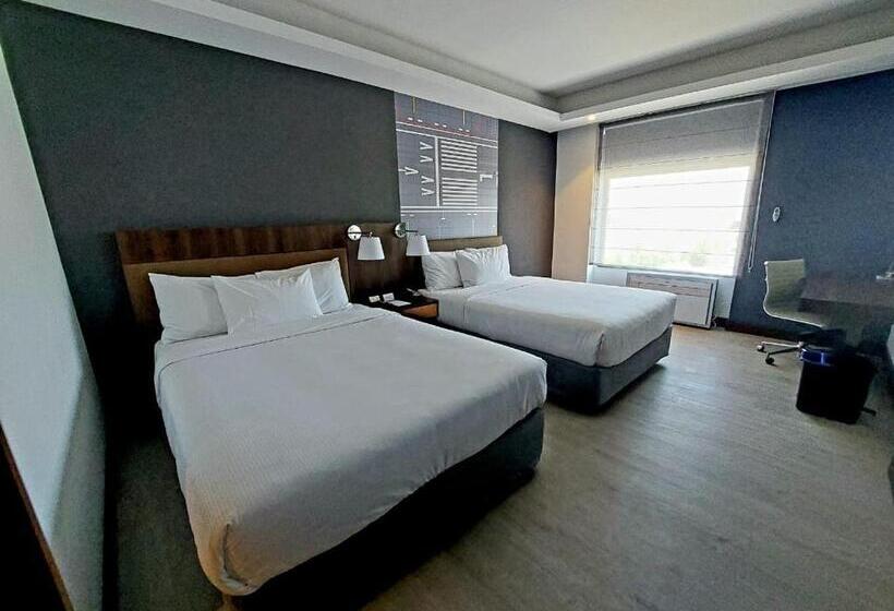Habitación Estándar 2 Camas Matrimonio, Courtyard By Marriott Santiago Airport