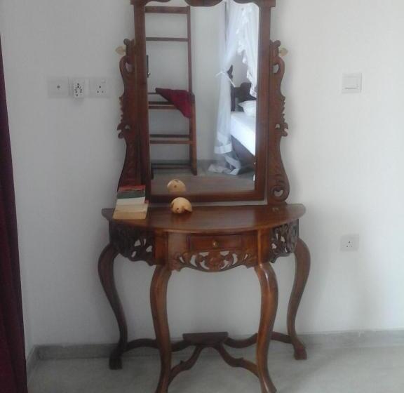 Quarto Deluxe Vista Mar, Peacock Wings Guest