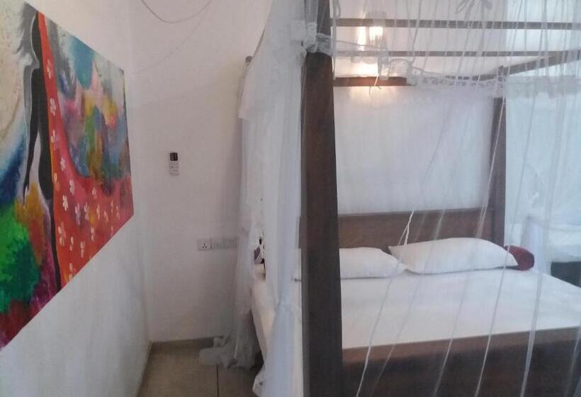 Quarto Triplo Deluxe Vista Mar, Peacock Wings Guest
